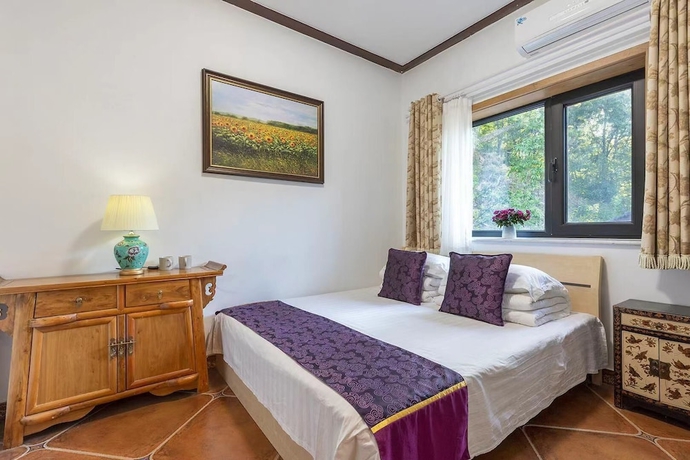 Imagen de la habitación del Hotel Mutianyu GreatWall Wangshanyuan Homestay. Foto 9
