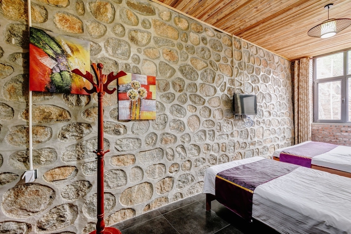 Imagen de la habitación del Hotel Mutianyu GreatWall Wangshanyuan Homestay. Foto 11