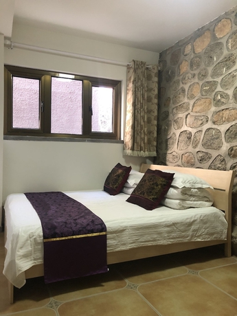 Imagen de la habitación del Hotel Mutianyu GreatWall Wangshanyuan Homestay. Foto 14