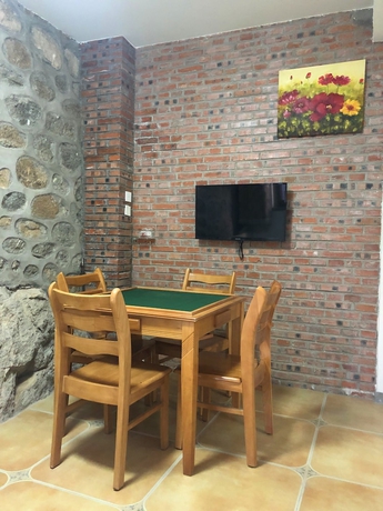 Imagen de la habitación del Hotel Mutianyu GreatWall Wangshanyuan Homestay. Foto 15