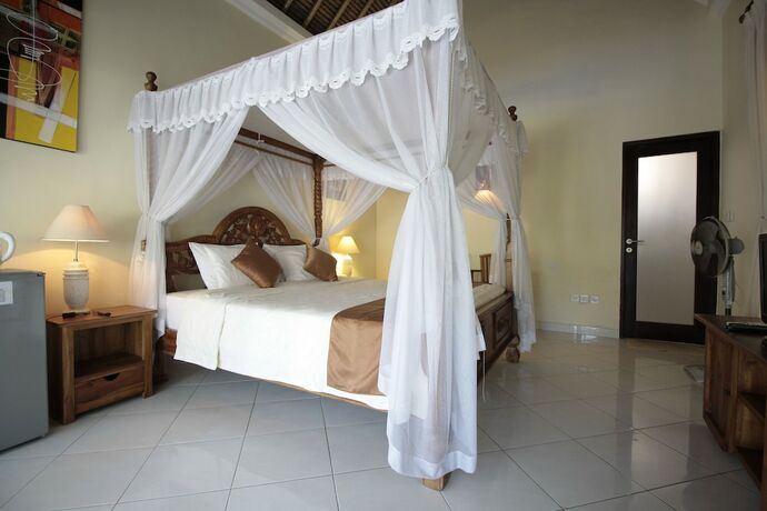 Imagen de la habitación del Hotel Mutiara Bali. Foto 20