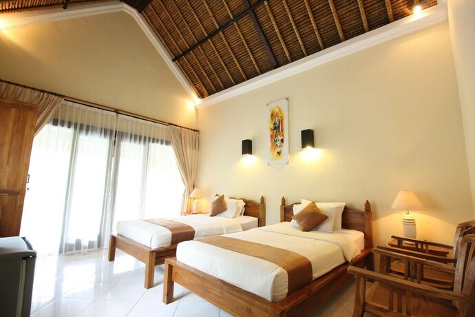 Imagen de la habitación del Hotel Mutiara Bali. Foto 21