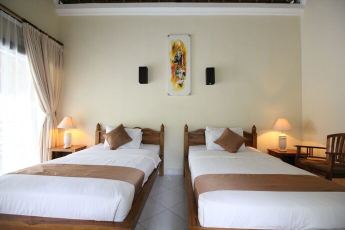 Imagen de la habitación del Hotel Mutiara Bali. Foto 22