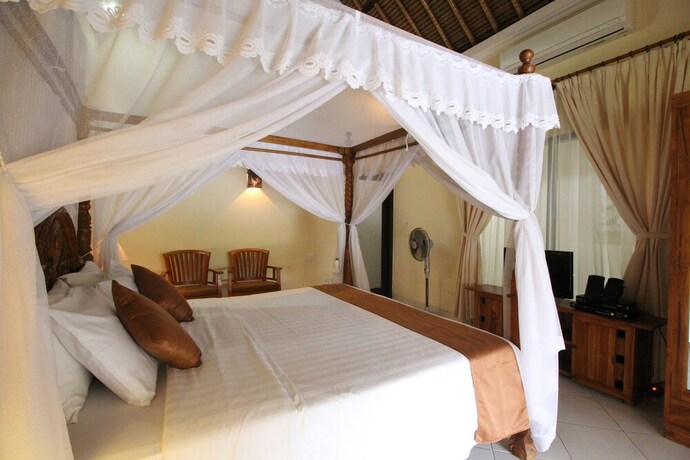 Imagen de la habitación del Hotel Mutiara Bali. Foto 23