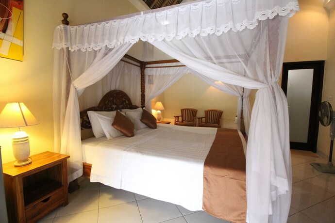 Imagen de la habitación del Hotel Mutiara Bali. Foto 24