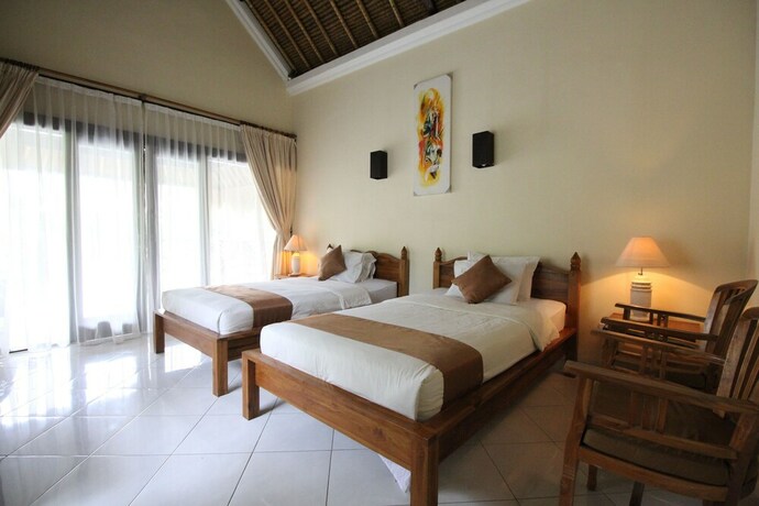 Imagen de la habitación del Hotel Mutiara Bali. Foto 29