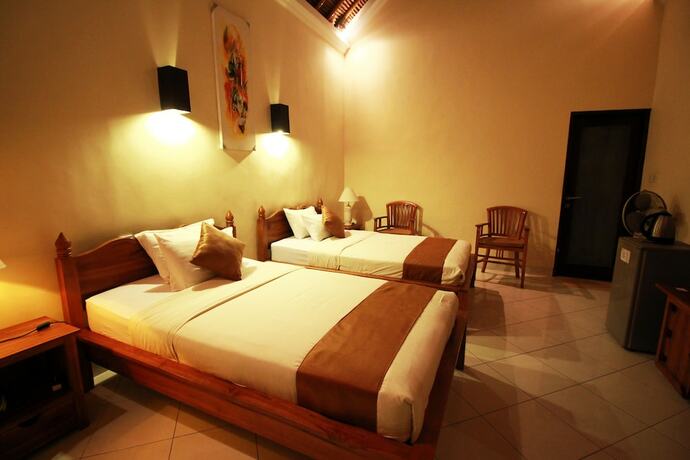 Imagen de la habitación del Hotel Mutiara Bali. Foto 30