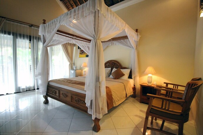 Imagen de la habitación del Hotel Mutiara Bali. Foto 33