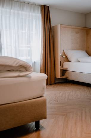 Imagen de la habitación del Hotel Müllers Self-Check-In. Foto 14