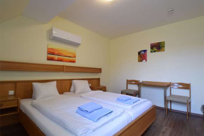 Imagen de la habitación del Hotel M&uuml;llner. Foto 9