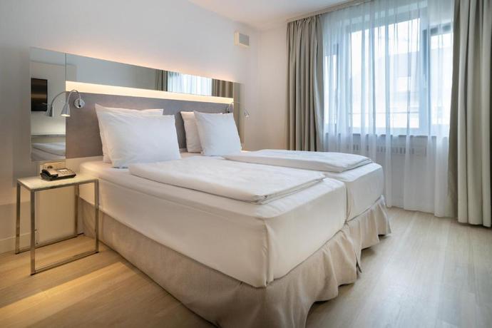 Imagen de la habitación del Hotel München City Center affiliated by Meliá. Foto 10