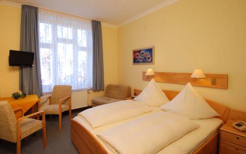 Imagen de la habitación del Hotel M&uuml;nchner L&ouml;wenbr&auml;u. Foto 10
