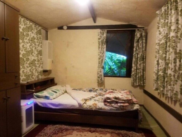 Imagen de la habitación del Hotel Muwmin Farm - Hostel. Foto 18