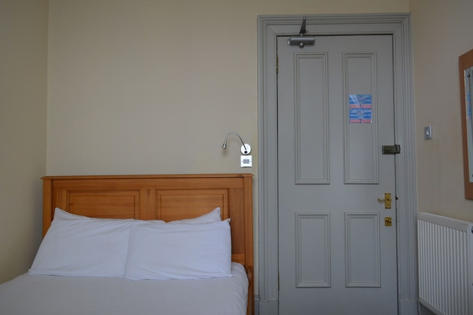 Imagen de la habitación del Hotel Mw Townhouse. Foto 6