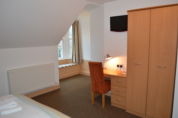 Imagen de la habitación del Hotel Mw Townhouse. Foto 10