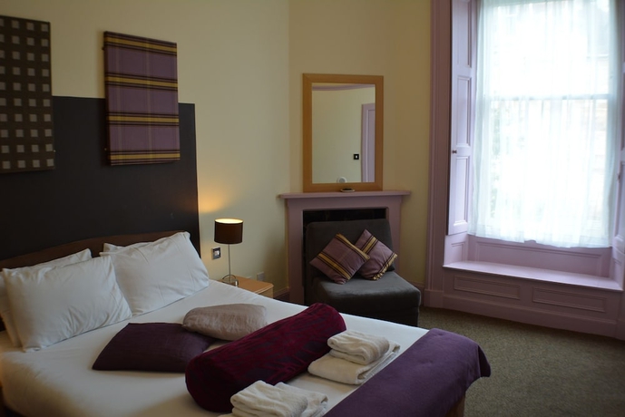 Imagen de la habitación del Hotel Mw Townhouse. Foto 11