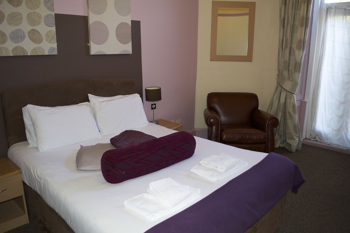 Imagen de la habitación del Hotel Mw Townhouse. Foto 12