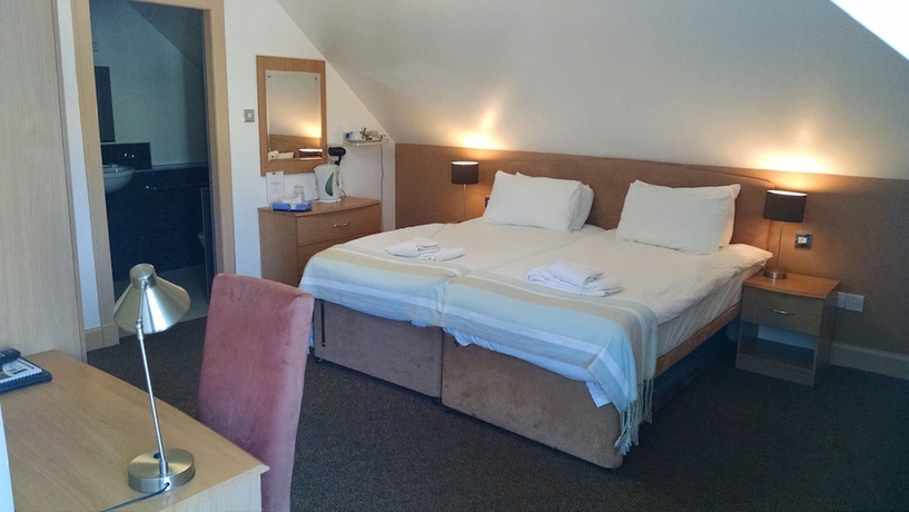 Imagen de la habitación del Hotel Mw Townhouse. Foto 13