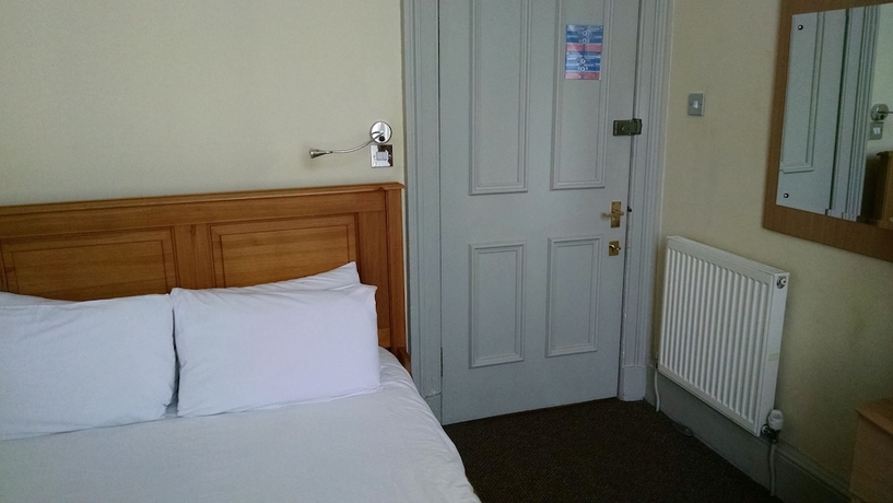 Imagen de la habitación del Hotel Mw Townhouse. Foto 14