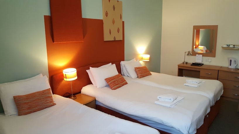 Imagen de la habitación del Hotel Mw Townhouse. Foto 15