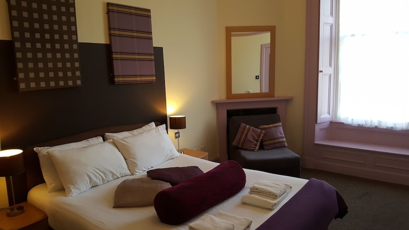 Imagen de la habitación del Hotel Mw Townhouse. Foto 17