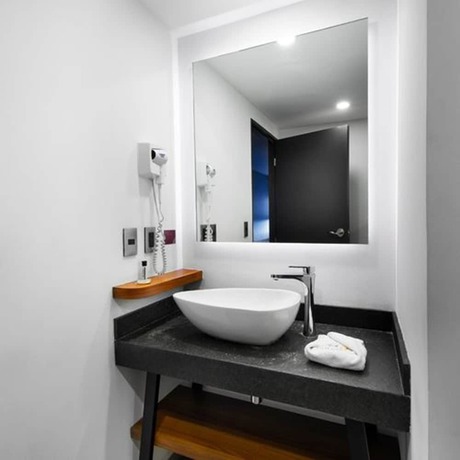 Imagen de la habitación del Hotel Mx Aeropuerto. Foto 11