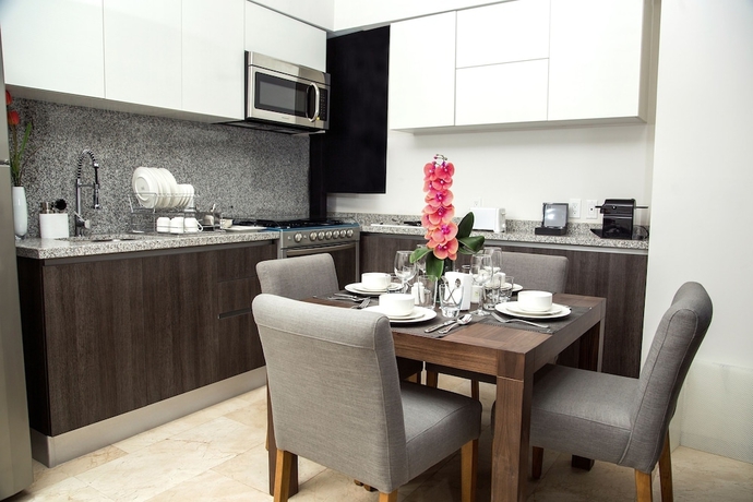 Imagen de la habitación del Hotel Mx Grand Suites. Foto 2