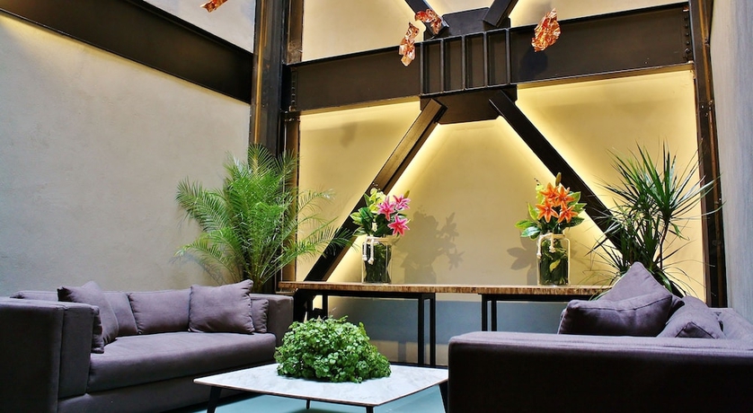 Imagen de los interiores del Hotel Mx Grand Suites. Foto 18