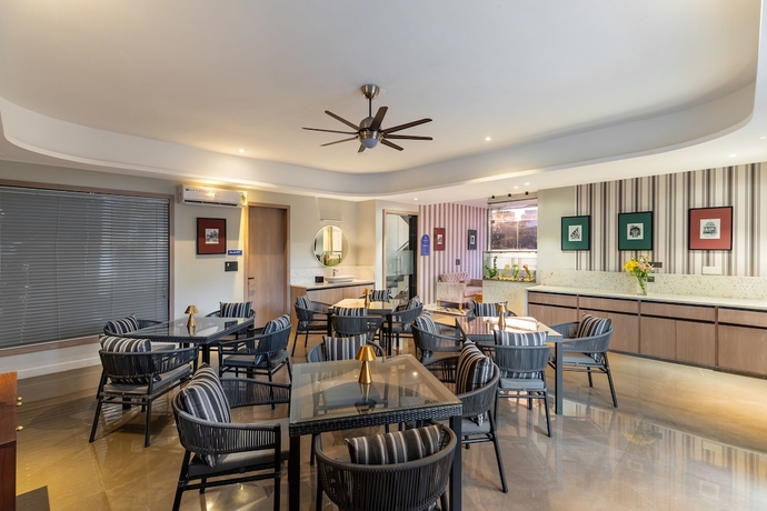 Imagen del bar/restaurante del Hotel My Downtown - Hotel Blue Chip Udaipur. Foto 2