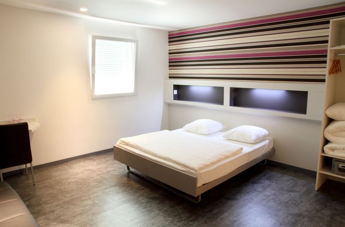 Imagen de la habitación del Hotel My, Givisiez. Foto 12