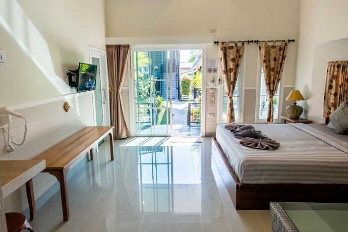 Imagen de la habitación del Hotel My Home Lantawadee Resort. Foto 19