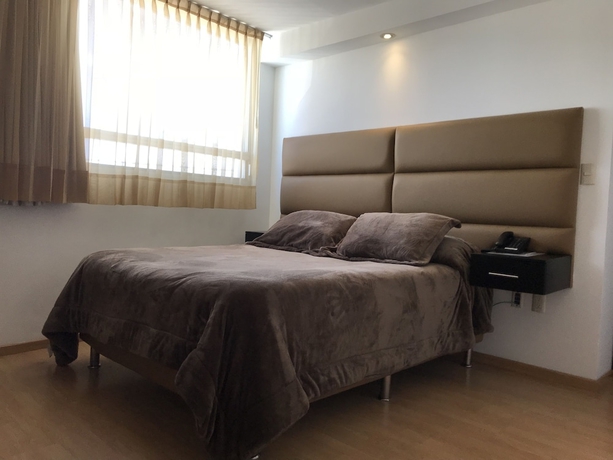 Imagen de la habitación del Hotel My Home Suites. Foto 3