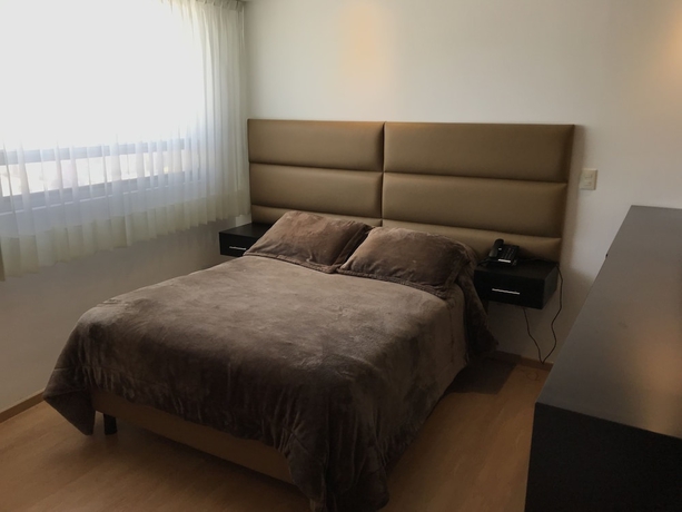 Imagen de la habitación del Hotel My Home Suites. Foto 6