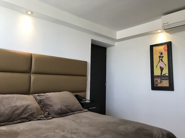 Imagen de la habitación del Hotel My Home Suites. Foto 9