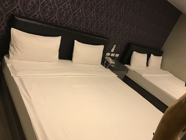 Imagen de la habitación del Hotel My House. Foto 18