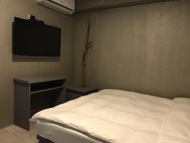 Imagen de la habitación del Hotel My House, Luodong. Foto 12