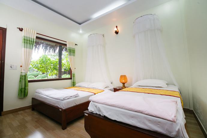 Imagen de la habitación del Hotel My Khanh Resort. Foto 9
