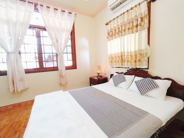 Imagen de la habitación del Hotel My Khanh Resort. Foto 20