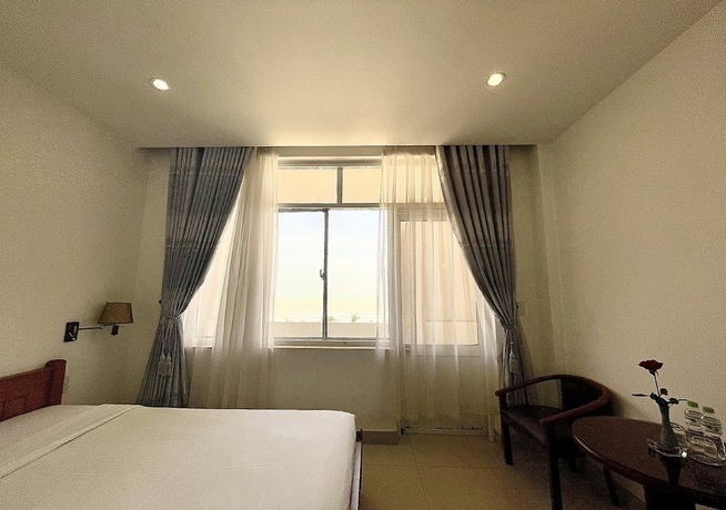 Imagen de la habitación del Hotel My Khe 2 Da Nang Seafront. Foto 23