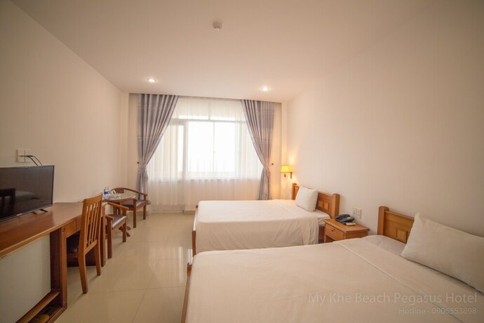 Imagen de la habitación del Hotel My Khe 2 Da Nang Seafront. Foto 28