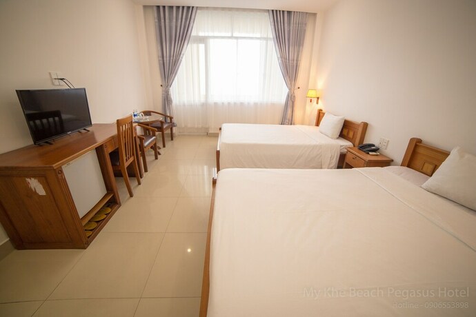 Imagen de la habitación del Hotel My Khe 2 Da Nang Seafront. Foto 33