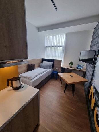 Imagen de la habitación del Hotel My MINGA Airport serviced Apartments. Foto 3