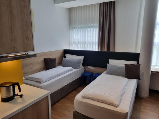 Imagen de la habitación del Hotel My MINGA Airport serviced Apartments. Foto 7