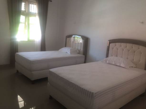 Imagen de la habitación del Hotel My New Lovina. Foto 8