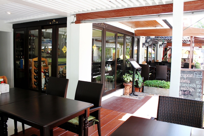 Imagen del bar/restaurante del Hotel My, Phuket. Foto 2