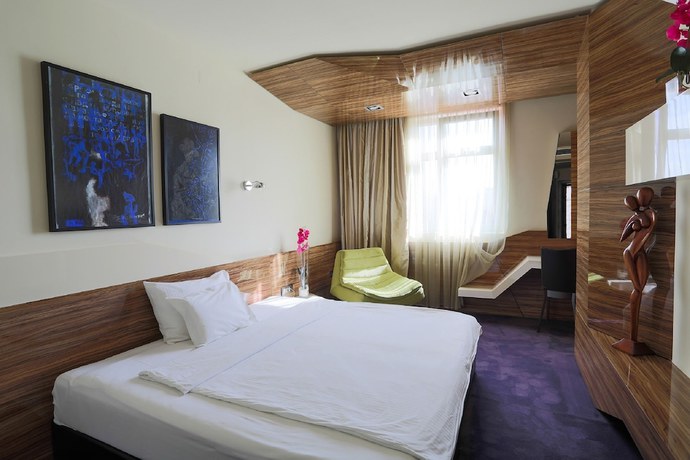 Imagen de la habitación del Hotel My Place Hotel. Foto 7