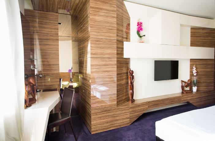 Imagen de la habitación del Hotel My Place Hotel. Foto 11