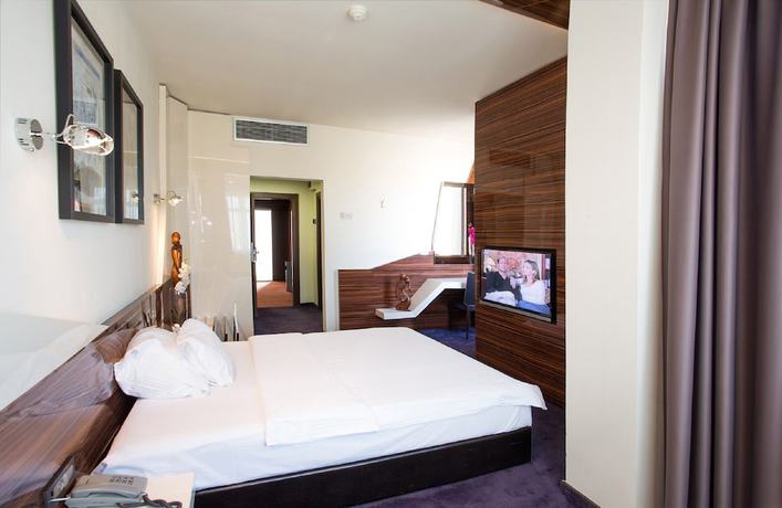 Imagen de la habitación del Hotel My Place Hotel. Foto 13