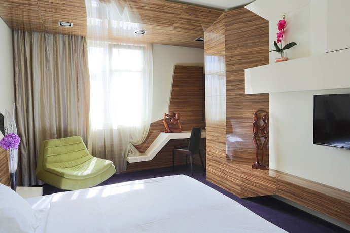 Imagen de la habitación del Hotel My Place Hotel. Foto 14