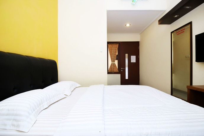 Imagen de la habitación del Hotel My Residence Cirebon. Foto 8